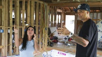 House Held Up by Car Jacks